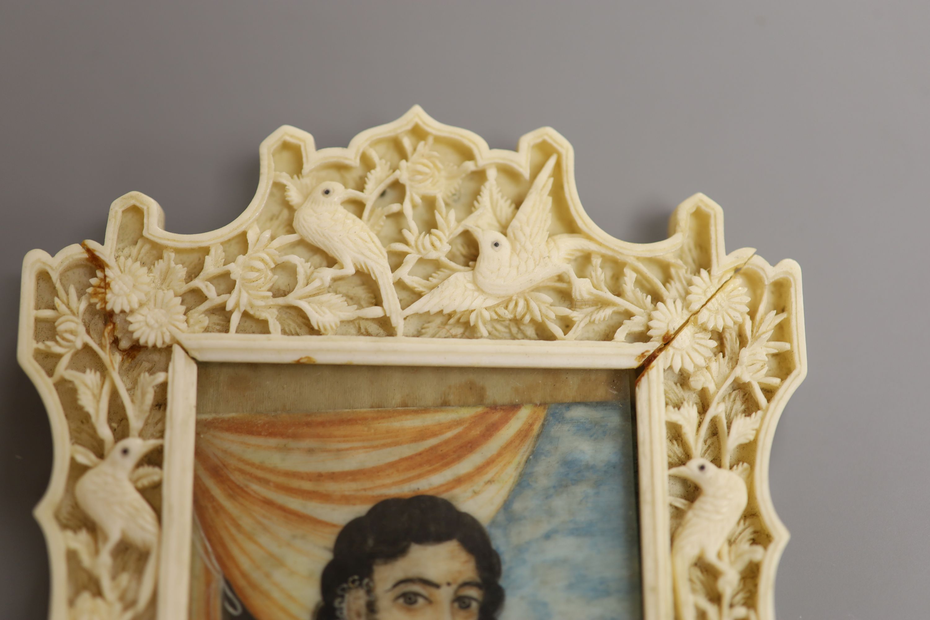 An Indian miniature gouache on ivory in a Chinese Ivory frame, circa 1900 8 x 5.5cm